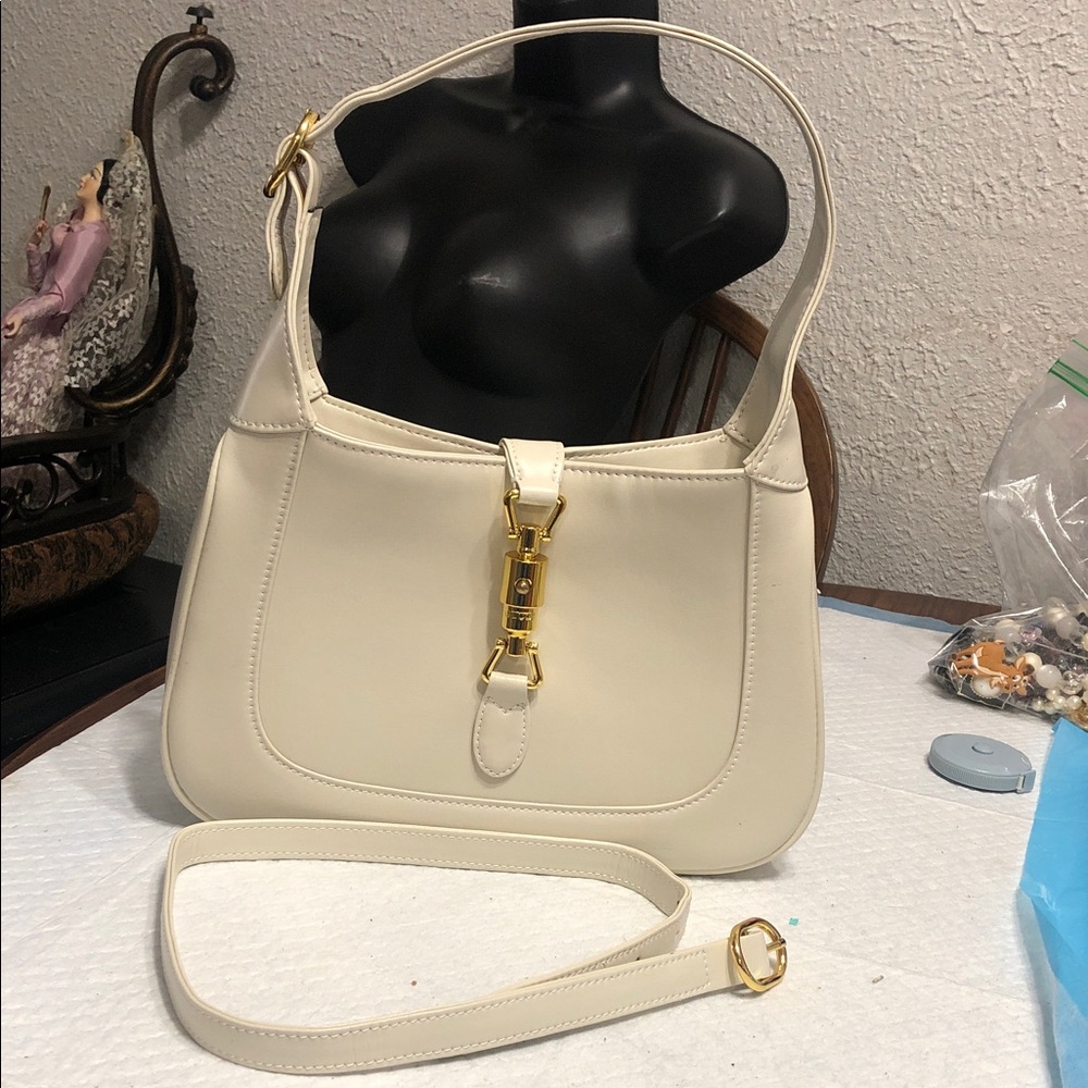 Elegant Cream Shoulder Bag with Gold Accent Hardware